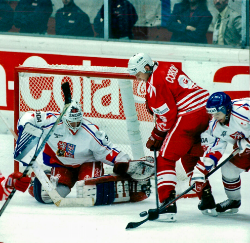 Petr Bříza protects the net vs Shayne Corson of Canada 1994 World Championships