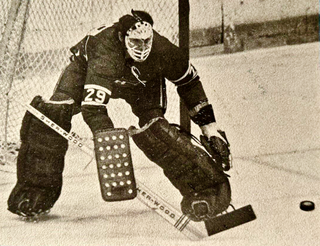 Montreal Canadiens rookie Ken Dryden tracking the puck 1971