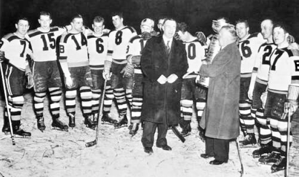 Frank Calder presents Stanley Cup to Art Ross 1939 Stanley Cup Champions