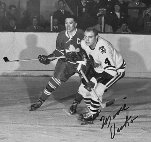 Toronto Maple Leafs captain George Armstrong and Chicago Black Hawks Elmer Vasko