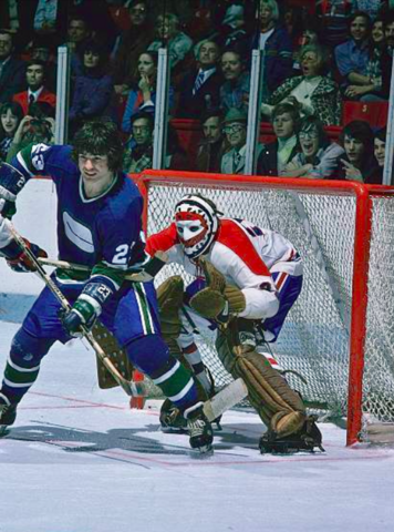 Canucks Gerry O'Flaherty and Canadiens Ken Dryden NHL Game Action 1975