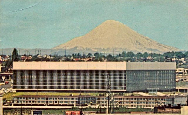 Memorial Coliseum / Veterans Memorial Coliseum with Mount St. Helens behind it.