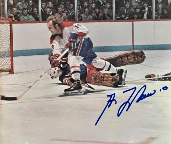 Montreal Canadiens Guy Lafleur scores on John Davidson of New York Rangers 1976