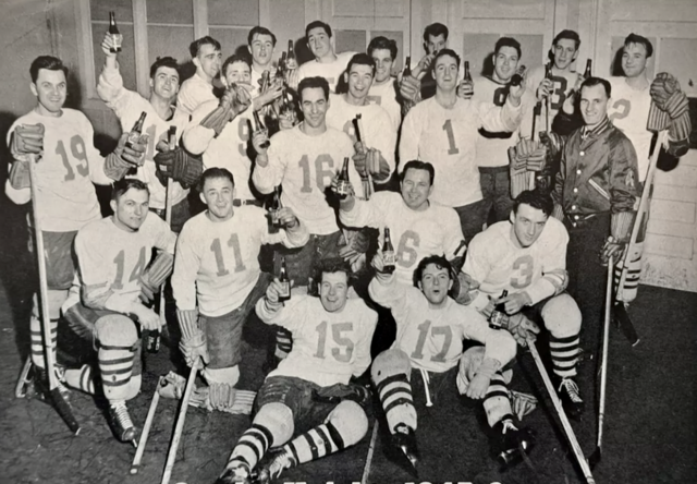 Omaha Knights drinking and cheering with 7up pop 1945