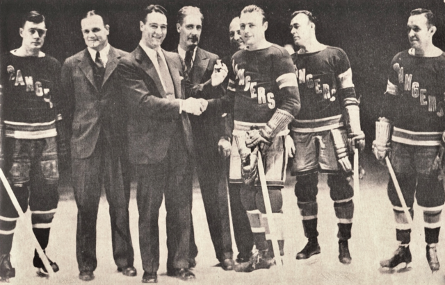 Murray Murdoch accepts ring from Lou Gehrig for 400th game played as a Ranger