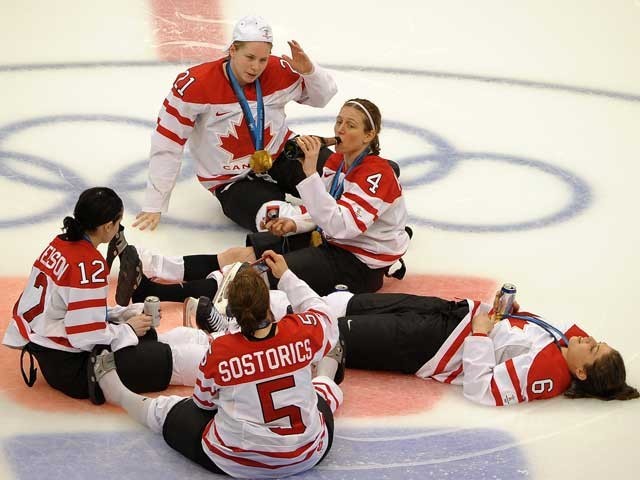 Team Canada Women at Centre Ice, Celebrating a Gold Medal Win