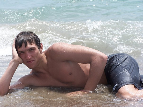 Alexander Ovechkin Shirtless lying in Ocean