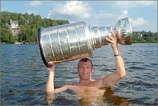 Martin Brodeur with the Stanley Cup in a Lake