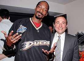 Snoop Dog wearing a Ducks Jersey with Gary Bettman