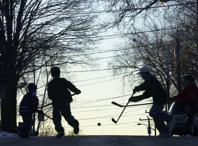 Kids Playing Street Hockey