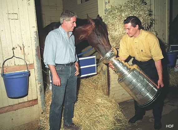  Nick Zito & Ed Olczyk watch Go for Gin eat from Stanley Cup