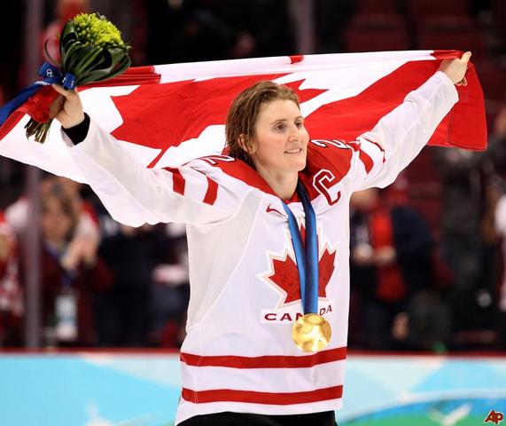 Hayley Wickenheiser with Olympic Gold Medal and Canada Flag