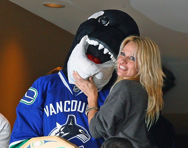 Pamela Anderson with Vancouver Canucks Mascot - Fin