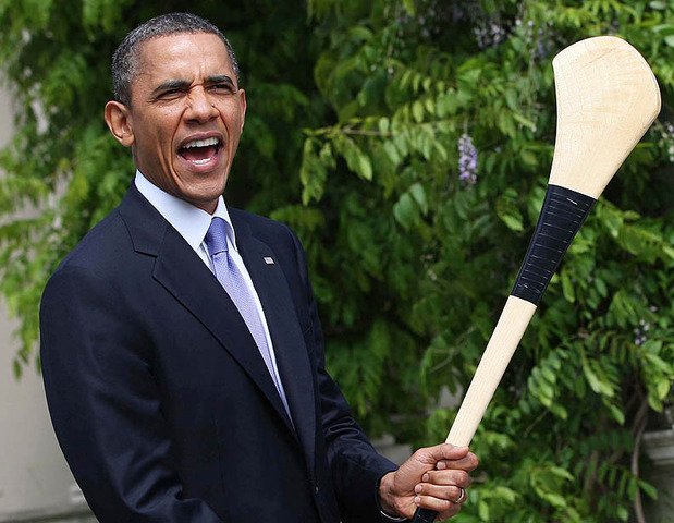 Barack Obama holds a Hurling Stick