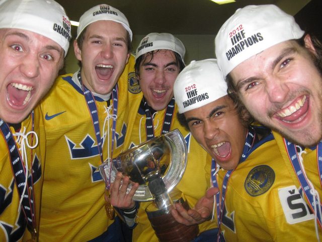 Team Sweden Players showing the Championship Trophy