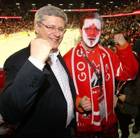 Prime Minister Harper with Team Canada Fan at Bronze Medal Game