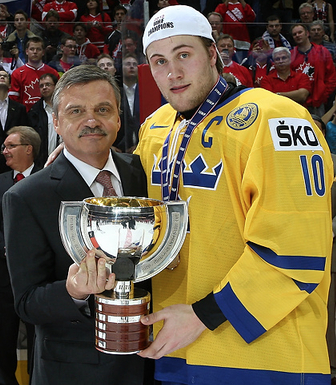 René Fasel Presents Johan Larsson the Trophy for World Champions