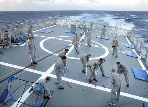 Deck Hockey - Royal Australian Navy  Officers in Game Action